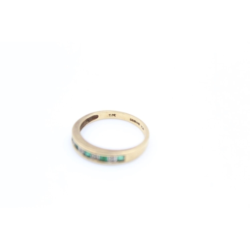 51 - A 9ct gold emerald & diamond half eternity ring, size L - approx. gross weight 1.8 grams