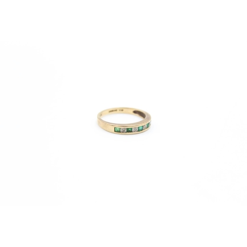 51 - A 9ct gold emerald & diamond half eternity ring, size L - approx. gross weight 1.8 grams