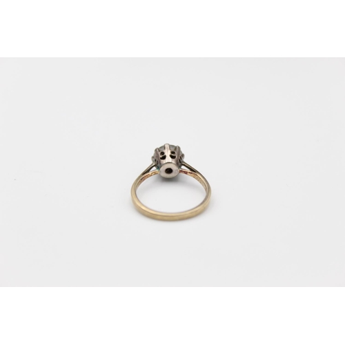 57 - A 9ct gold stone set solitaire ring, size L - approx. gross weight 2 grams