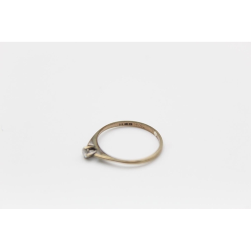 81 - A 9ct gold diamond solitaire ring, size K -approx. gross weight 0.7 grams