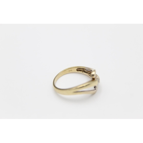99 - A 9ct gold stylised gemstone solitaire ring, size Q ½ - approx. gross weight 2.6 grams