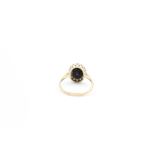 101 - A 9ct gold sapphire and gemstone set cluster ring, size N - approx. gross weight 2.5 grams