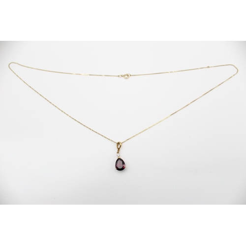 111 - A 9ct gold diamond and gemstone pendant 45cm necklace - approx. gross weight 1.8 grams