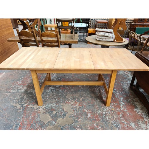 A modern beech rectangular dining table - approx. 75cm high x 90cm wide ...