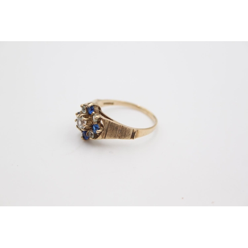 106 - A hallmarked London 9ct gold gemstone cluster ring, size R - approx. gross weight 2.9 grams