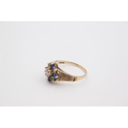 106 - A hallmarked London 9ct gold gemstone cluster ring, size R - approx. gross weight 2.9 grams