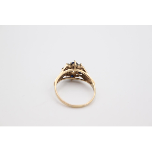 106 - A hallmarked London 9ct gold gemstone cluster ring, size R - approx. gross weight 2.9 grams