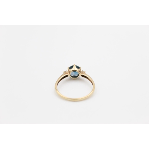 116 - A 9ct gold blue gemstone ring, size R - approx. gross weight 2 grams