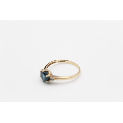 116 - A 9ct gold blue gemstone ring, size R - approx. gross weight 2 grams