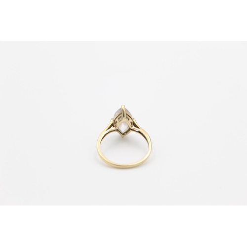 136 - A 9ct gold diamond shoulder ring, size Q - approx. gross weight 2.6 grams