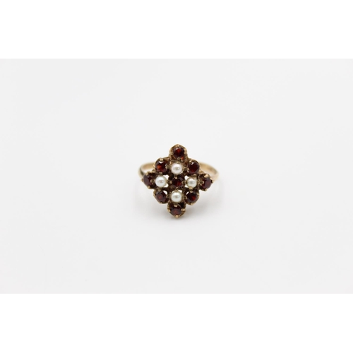 139 - A hallmarked Birmingham 9ct gold garnet and pearl ring, size O ½ - approx. gross weight 3.4 grams