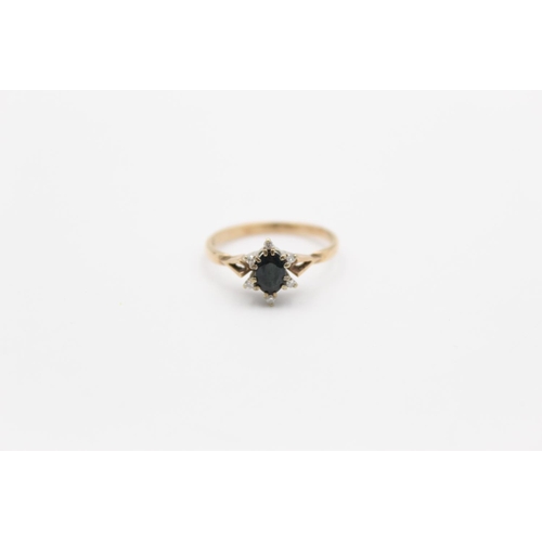 148 - A hallmarked London 9ct gold sapphire and diamond star burst ring, size O½ - approx. gross weight 2.... 