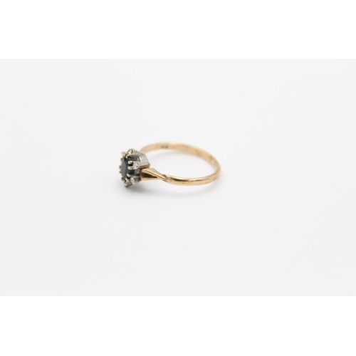 148 - A hallmarked London 9ct gold sapphire and diamond star burst ring, size O½ - approx. gross weight 2.... 