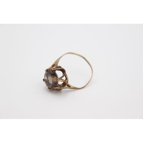 171 - A 1970s 9ct gold smoky quartz cocktail ring, size V - approx. gross weight 2.7 grams