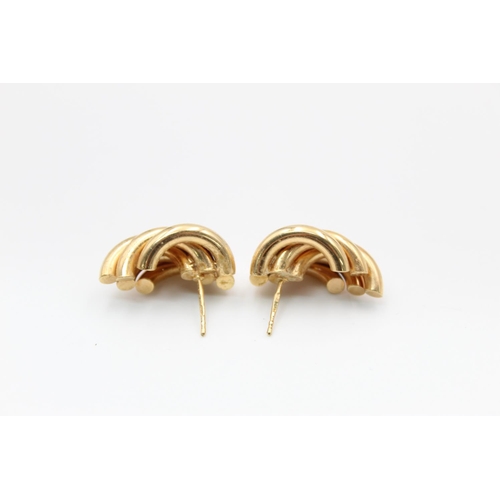 218 - A pair of 9ct gold abstract swirl stud earrings - approx. gross weight 3.5 grams