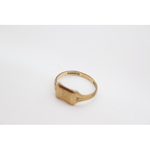 92 - A hallmarked Birmingham 9ct gold rectangular signet ring, size N ½ - approx. gross weight 2 grams