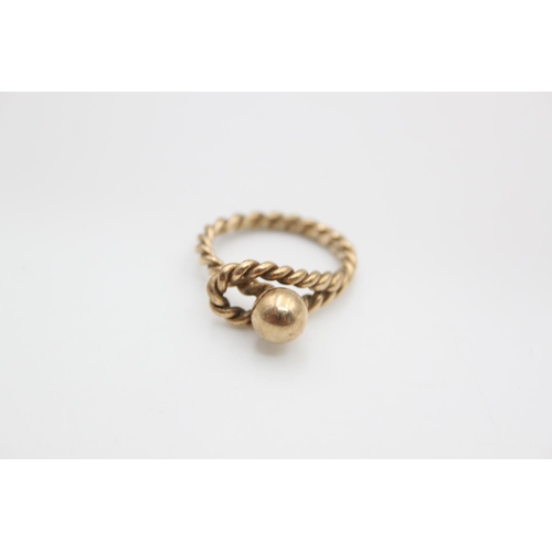 94 - A 9ct gold rope design ring, size O - approx. gross weight 4 grams