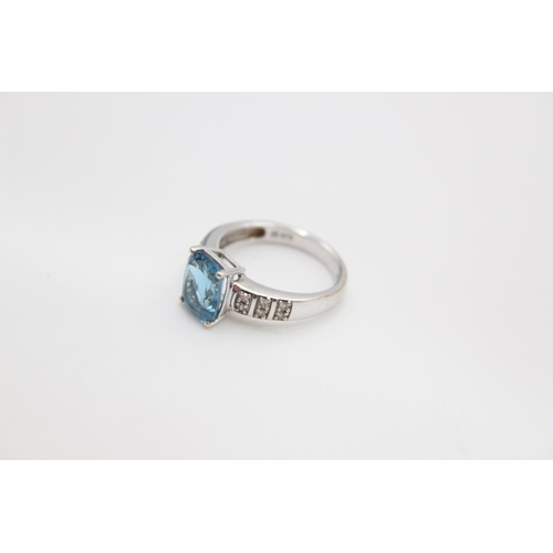 98 - A hallmarked Birmingham 9ct white gold diamond and aquamarine paste ring, size L ½ - approx. gross w... 