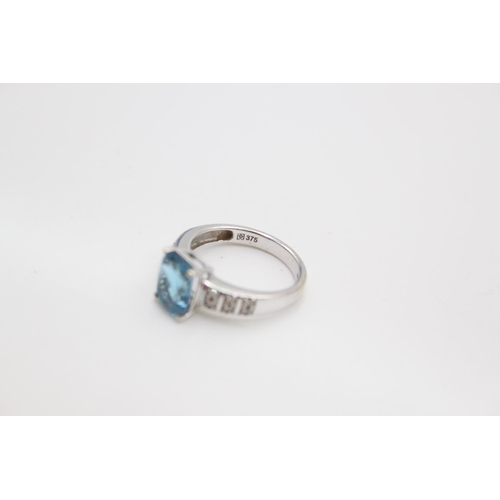 98 - A hallmarked Birmingham 9ct white gold diamond and aquamarine paste ring, size L ½ - approx. gross w... 