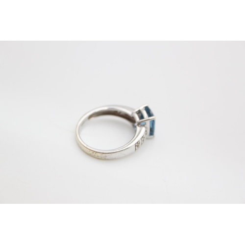 98 - A hallmarked Birmingham 9ct white gold diamond and aquamarine paste ring, size L ½ - approx. gross w... 