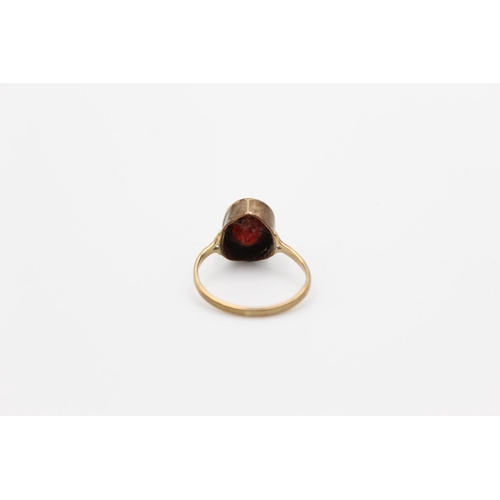 111 - A hallmarked Birmingham 9ct gold garnet soltiaire ring, size L  - approx. gross weight 3 grams