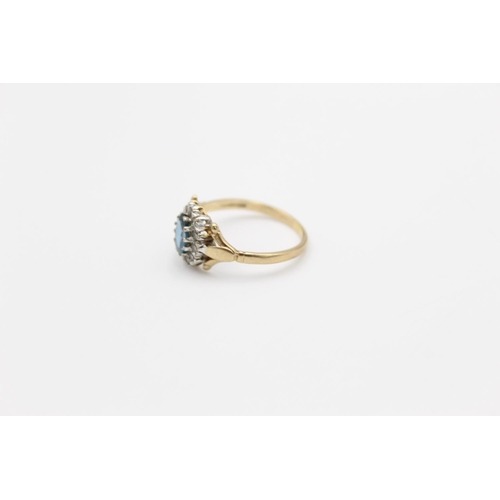 112 - A hallmarked Birmingham 9ct gold blue stone halo ring, size P ½ - approx. gross weight 2.2 grams