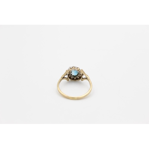 112 - A hallmarked Birmingham 9ct gold blue stone halo ring, size P ½ - approx. gross weight 2.2 grams