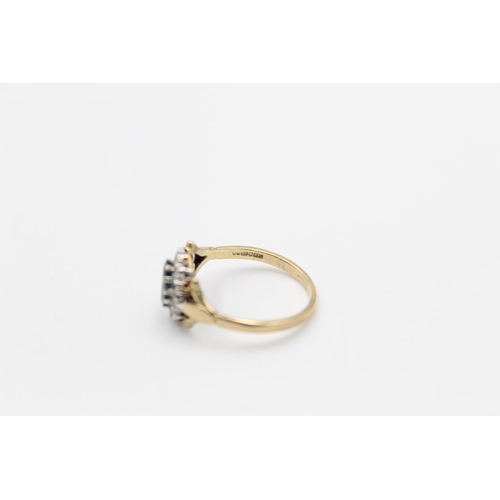 112 - A hallmarked Birmingham 9ct gold blue stone halo ring, size P ½ - approx. gross weight 2.2 grams