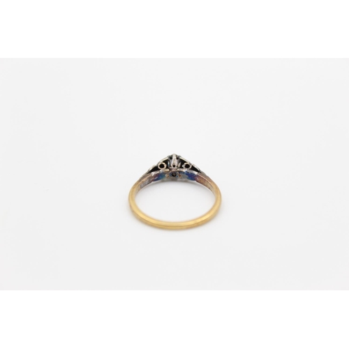 131 - An 18ct gold diamond solitaire ring, size M - approx. gross weight 2.3 grams