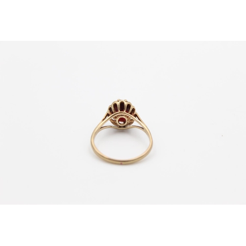 145 - A hallmarked Birmingham 9ct gold garnet solitaire ring, size Q - approx. gross weight 2.6 grams