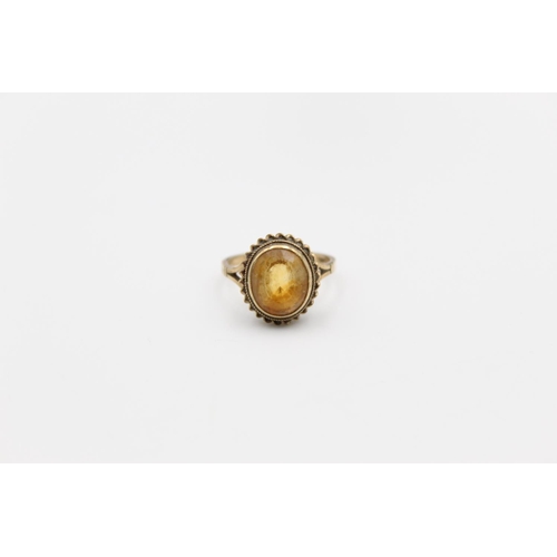 163 - A hallmarked Birmingham 9ct gold citrine solitaire ring, size P½ - approx. gross weight 3.4 grams