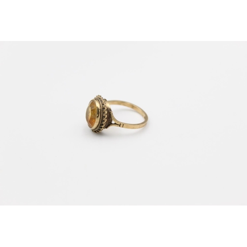 163 - A hallmarked Birmingham 9ct gold citrine solitaire ring, size P½ - approx. gross weight 3.4 grams