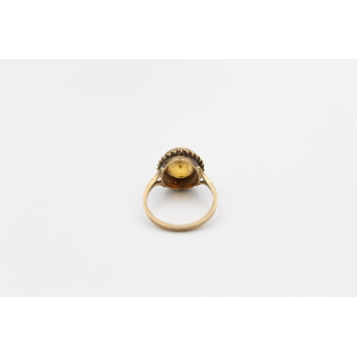 163 - A hallmarked Birmingham 9ct gold citrine solitaire ring, size P½ - approx. gross weight 3.4 grams