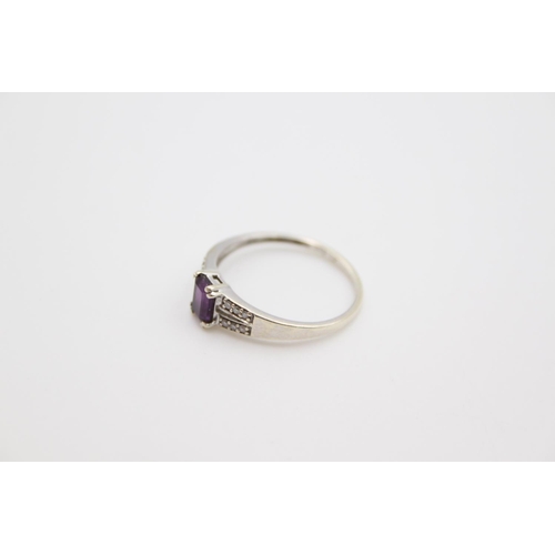 167 - A 9ct white gold amethyst and diamond shoulder ring, size P ½ - approx. gross weight 1.6 grams