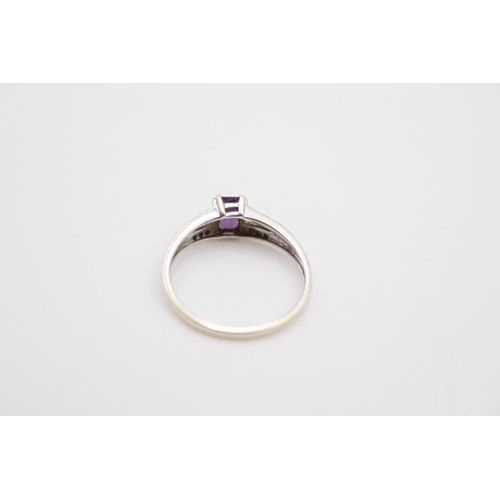 167 - A 9ct white gold amethyst and diamond shoulder ring, size P ½ - approx. gross weight 1.6 grams