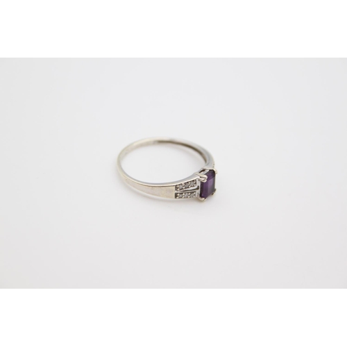 167 - A 9ct white gold amethyst and diamond shoulder ring, size P ½ - approx. gross weight 1.6 grams