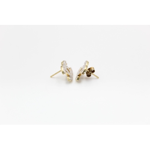 186 - A pair of 9ct gold CZ set CC studs - approx. gross weight 2.6 grams