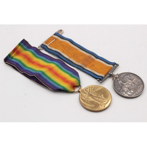 536 - A WW1 Medal pair presented to S-32202 Pte J.W Taylor Camerons