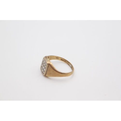 64 - A hallmarked Birmingham 9ct gold gemstone set signet ring, size O - approx. gross weight 2.4 grams