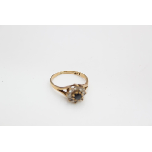 105 - A hallmarked London 9ct gold gemstone cluster ring, size J ½ - approx. gross weight 1.8 grams