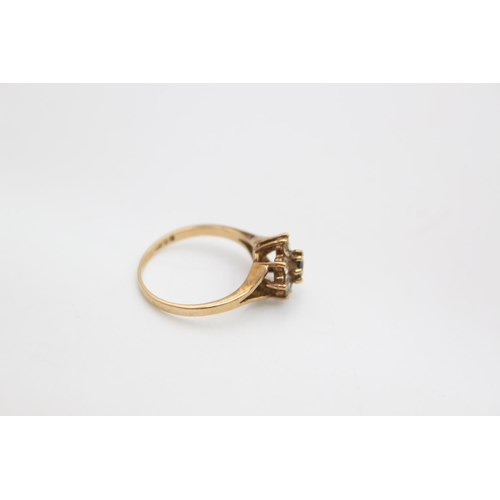 105 - A hallmarked London 9ct gold gemstone cluster ring, size J ½ - approx. gross weight 1.8 grams