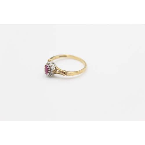 119 - A 9ct gold diamond and ruby halo ring, size P ½ - approx. gross weight 2.1 grams