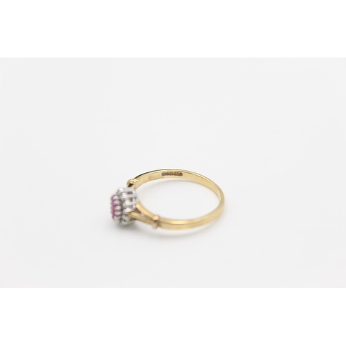 119 - A 9ct gold diamond and ruby halo ring, size P ½ - approx. gross weight 2.1 grams