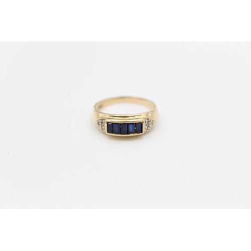 124 - A 9ct gold diamond and sapphire ring, size Q - approx. gross weight 2.4 grams