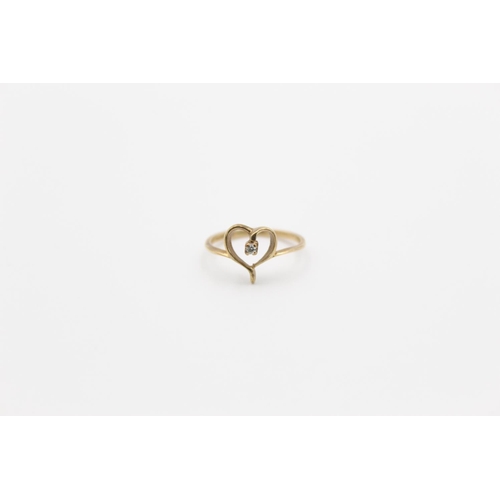 153 - A 9ct gold diamond love heart ring, size G - approx. gross weight 1.1 grams