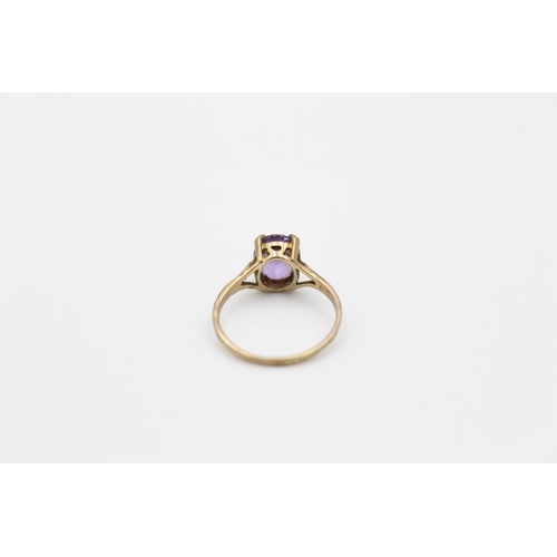 160 - A 9ct gold amethyst set dress ring, size M ½ - approx. gross weight 1.7 grams