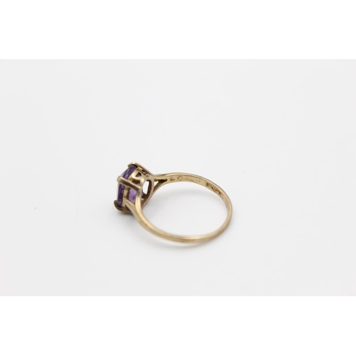 160 - A 9ct gold amethyst set dress ring, size M ½ - approx. gross weight 1.7 grams