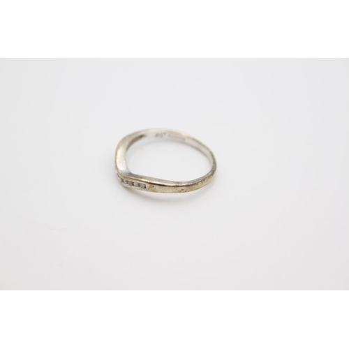 170 - A hallmarked Birmingham 9ct white gold diamond set wishbone half eternity ring, size O ½ - approx. g... 