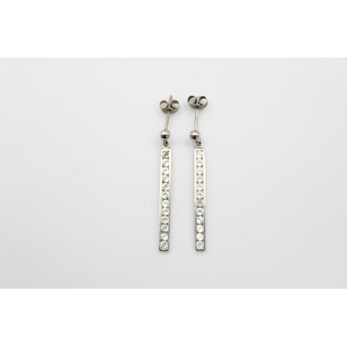 185 - A pair of 9ct white gold CZ set bar drop earrings - approx. gross weight 1.7 grams