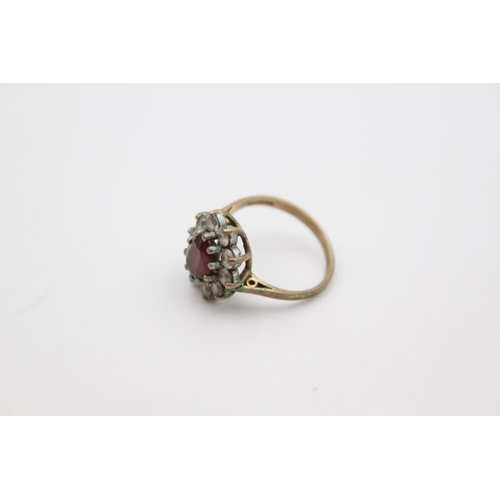 62 - A 9ct garnet set cluster dress ring, size L - approx. gross weight 3 grams